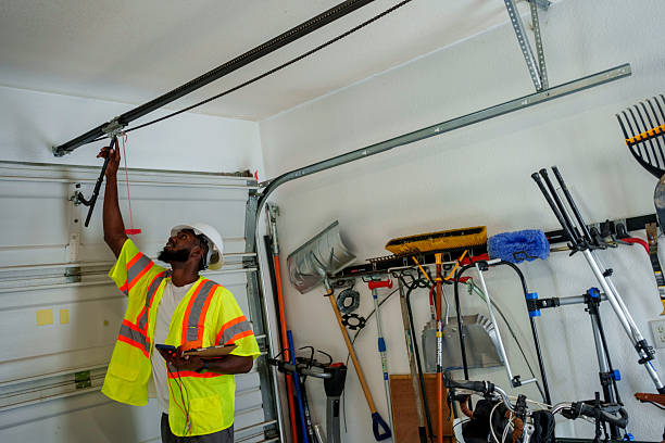 Professional Garage Door Panel Replacement technician working in Bushyhead, OK